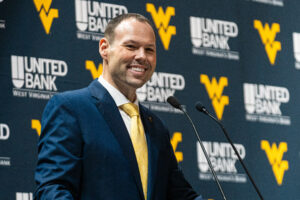 WVU reaches full revenue sharing, AD Wren Baker dealing with drawbacks